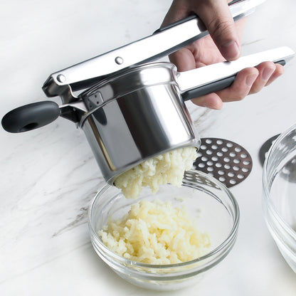 Mashed potato press with silicone handle