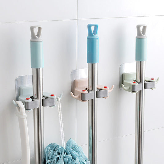 Nail-free multi-function traceless mop holder receives mop