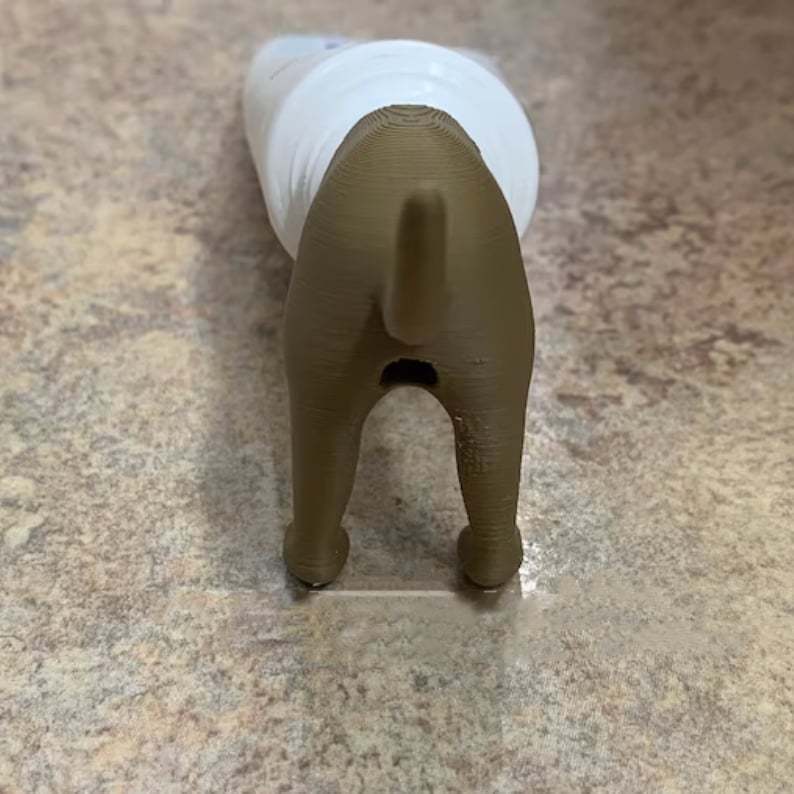 Household Fashion Simple Dog Butt Shape Toothpaste Topper