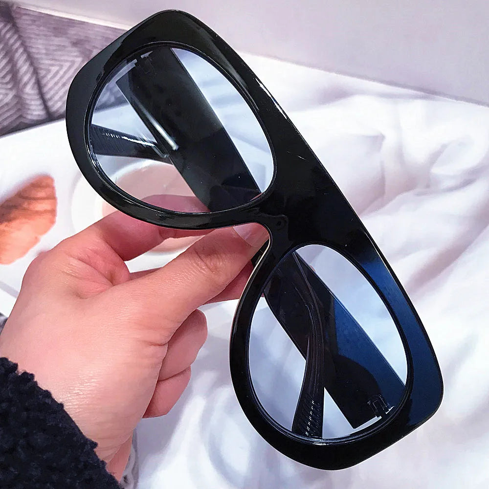 Vintage thick frame stripe oval sunglasses for women